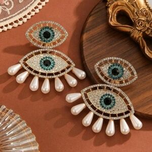 BRAND NEW ** Elegant Gold and White Eye Motif Earrings